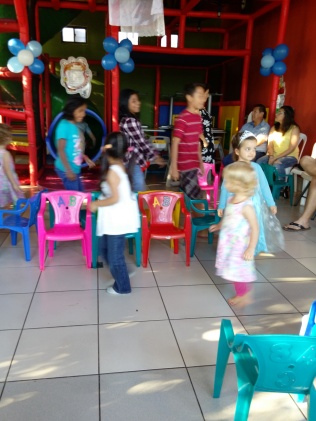 Children playing musical chairs